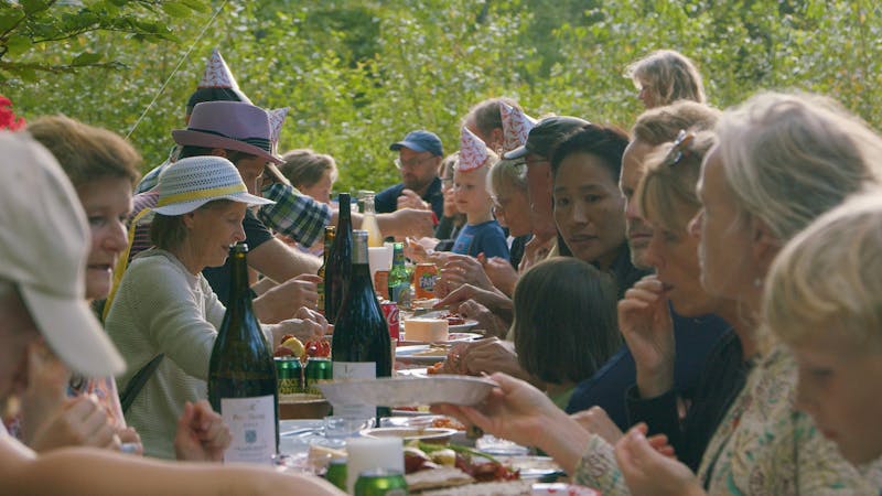 Community dining - members sharing a meal together